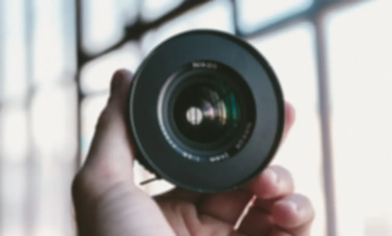 Which material is more suitable for use as a Lens shell: plastic or metal?